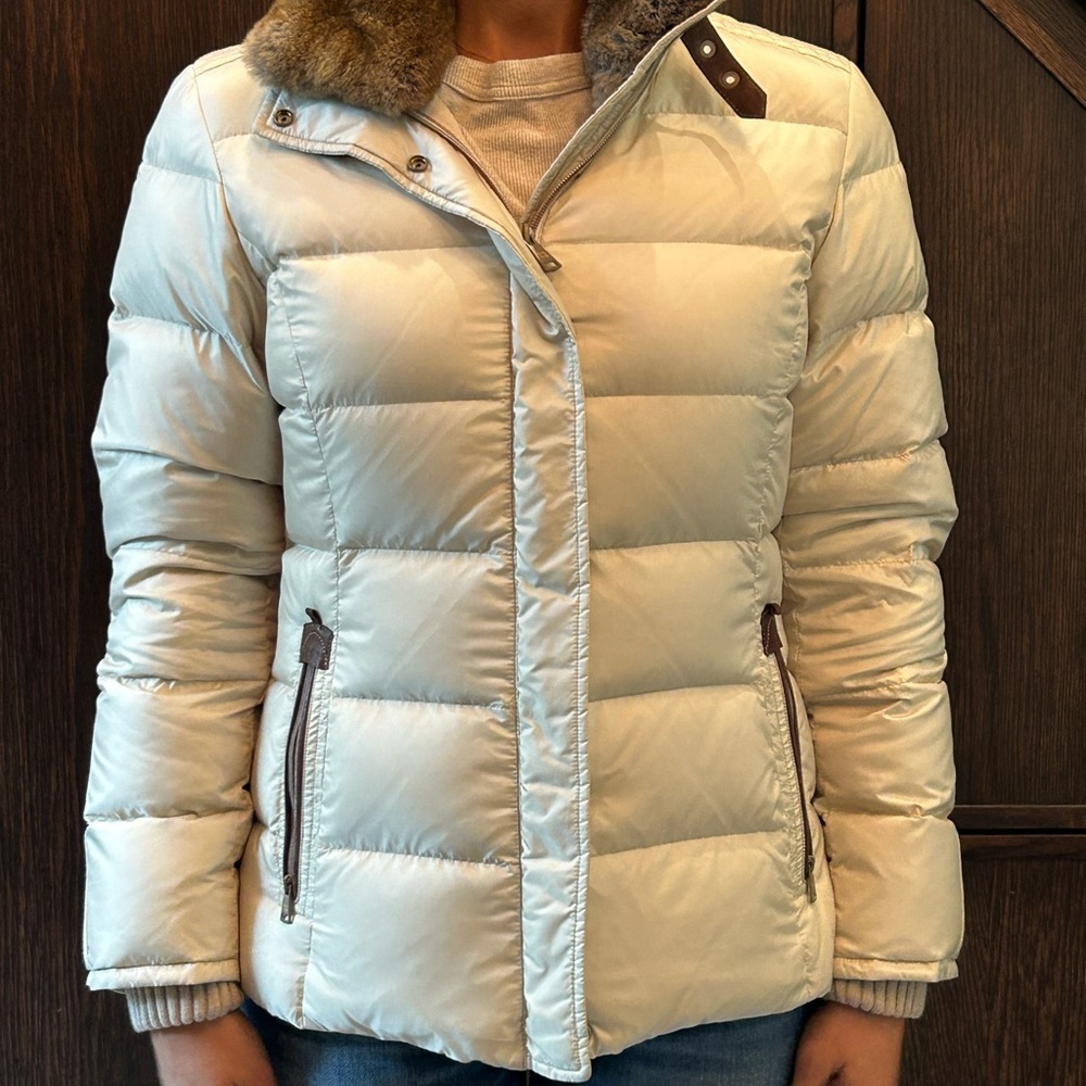 Handstich down jacket with fur trim